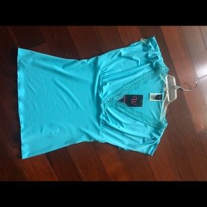 New w/ tags. Never worn. 95%polyester & 5% spandex